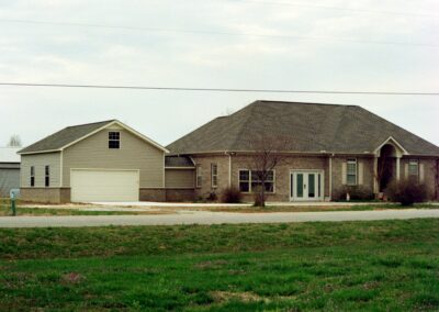 Garage with upper bonus room built by MasterCraft Construction