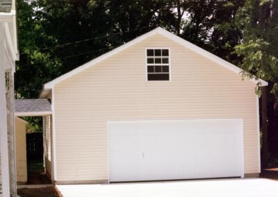 Garage with upper bonus room built by MasterCraft Construction