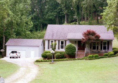 Single garage door with one walkthrough door by MasterCraft Construction