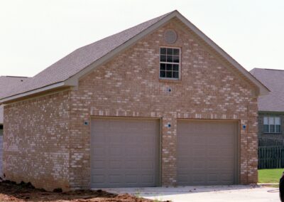 Garage with upper bonus room built by MasterCraft Construction