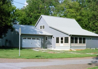 Single garage door with one walkthrough door by MasterCraft Construction