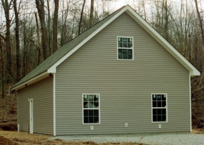 Garage with upper bonus room built by MasterCraft Construction