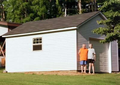Single garage door with one walkthrough door by MasterCraft Construction