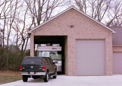Custom garage with distinctive design features by MasterCraft Construction