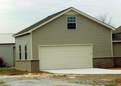 Garage with upper bonus room built by MasterCraft Construction