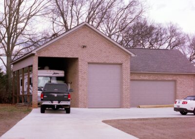 Custom garage with distinctive design features by MasterCraft Construction