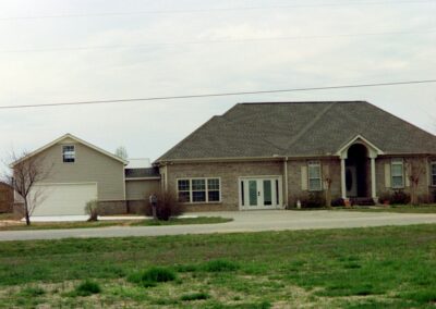 Garage with upper bonus room built by MasterCraft Construction