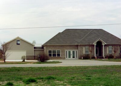 Garage with upper bonus room built by MasterCraft Construction
