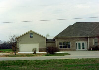 Garage with upper bonus room built by MasterCraft Construction