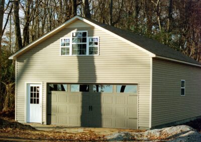 Garage with upper bonus room built by MasterCraft Construction