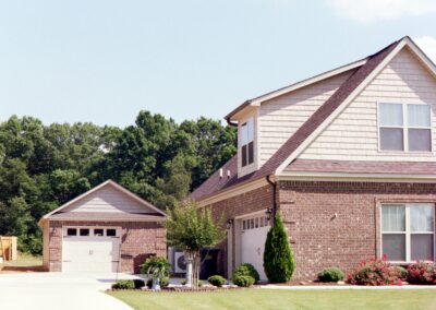 Single garage door with one walkthrough door by MasterCraft Construction