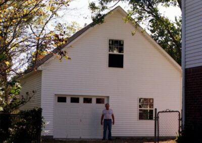 Garage with upper bonus room built by MasterCraft Construction