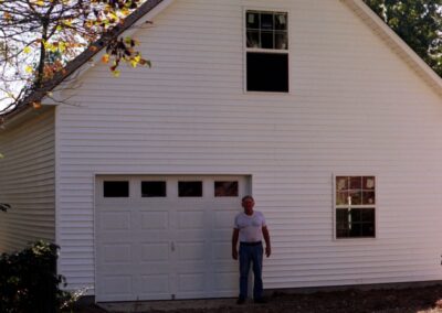 Garage with upper bonus room built by MasterCraft Construction